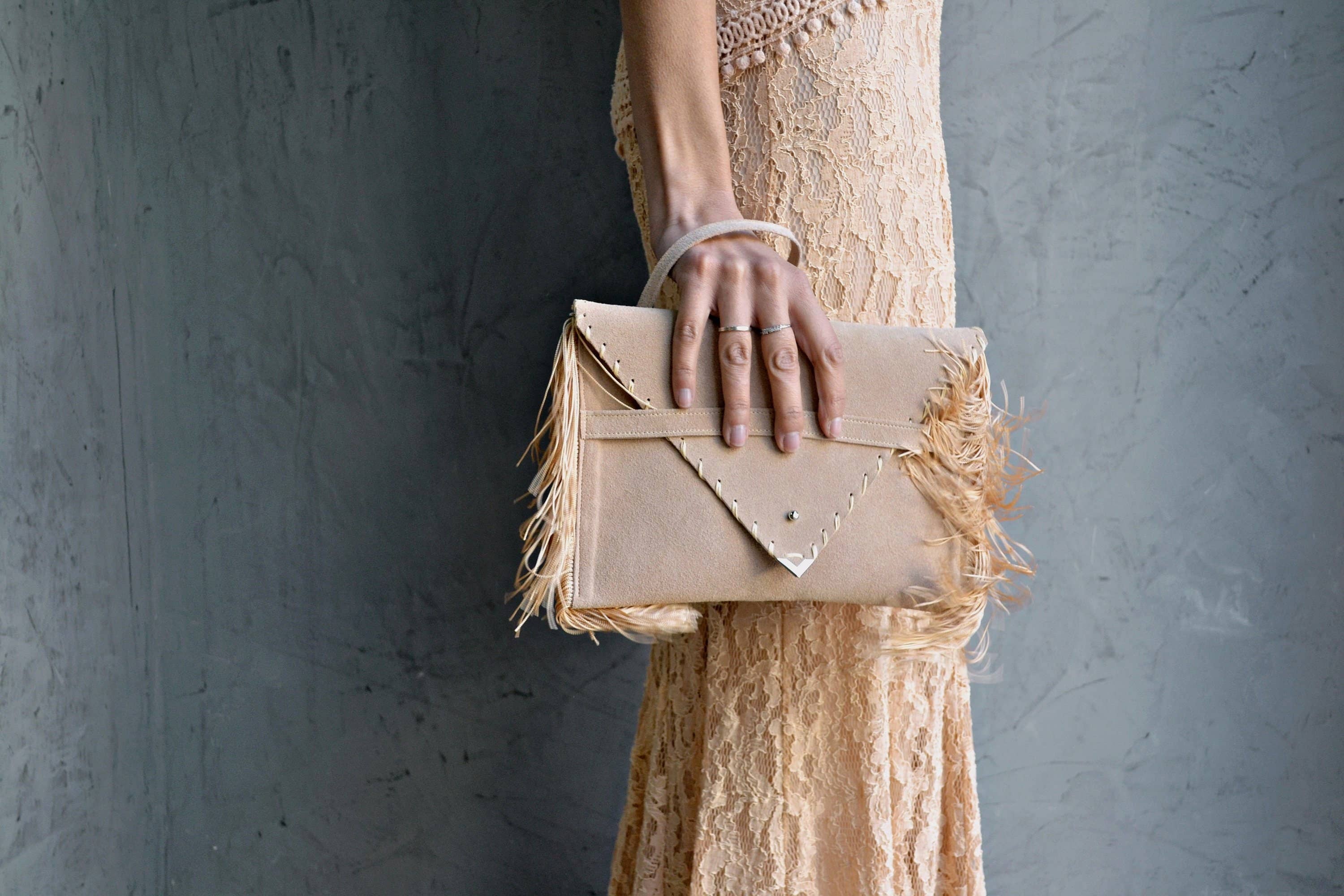 Medusa Clutch In Beige With Silk Fringe And Silver Hardware